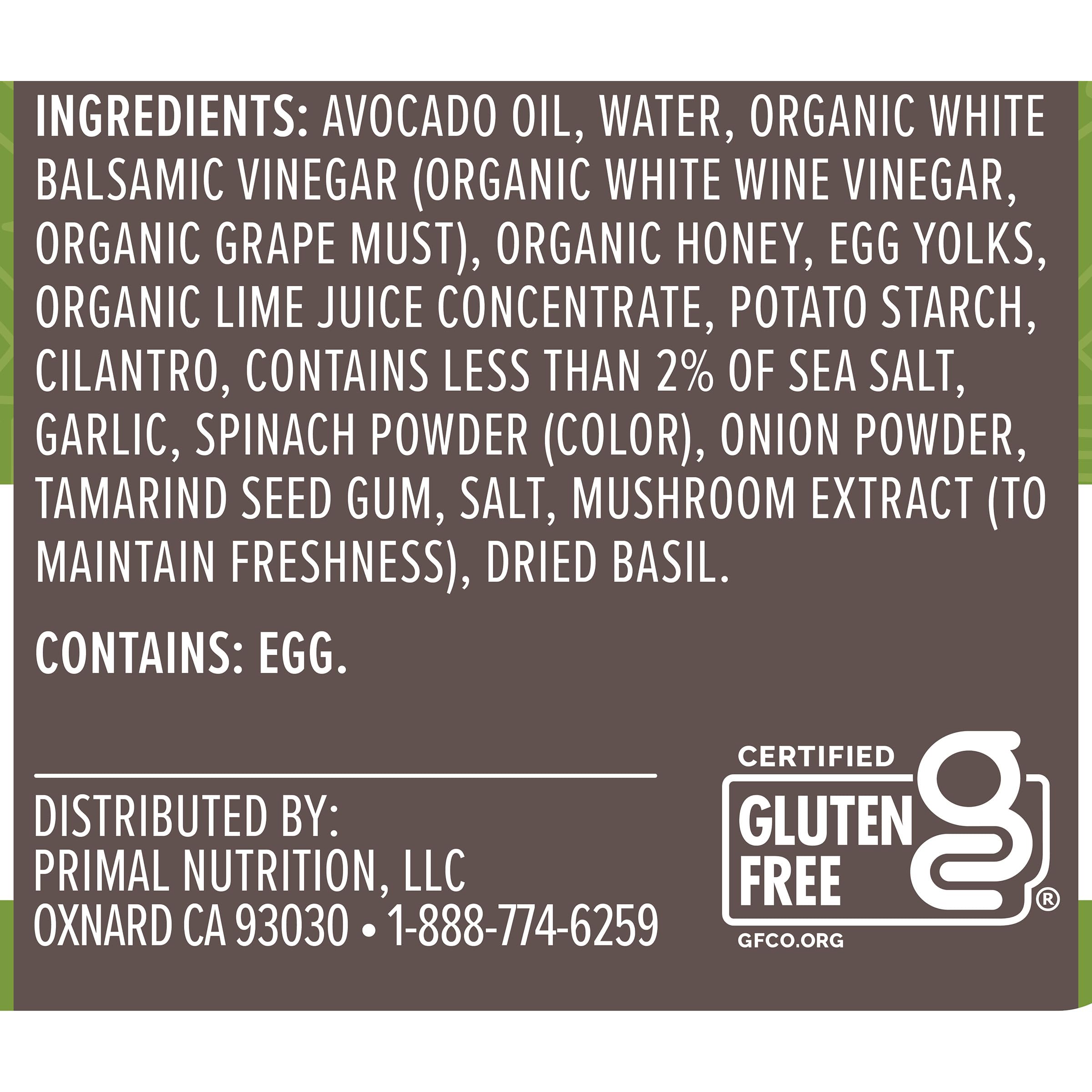 Primal Kitchen Cilantro Lime Dressing label close-up highlights ingredients.