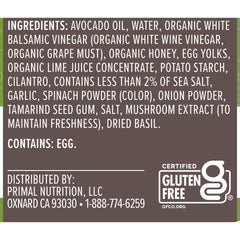 Primal Kitchen Cilantro Lime Dressing label close-up highlights ingredients.