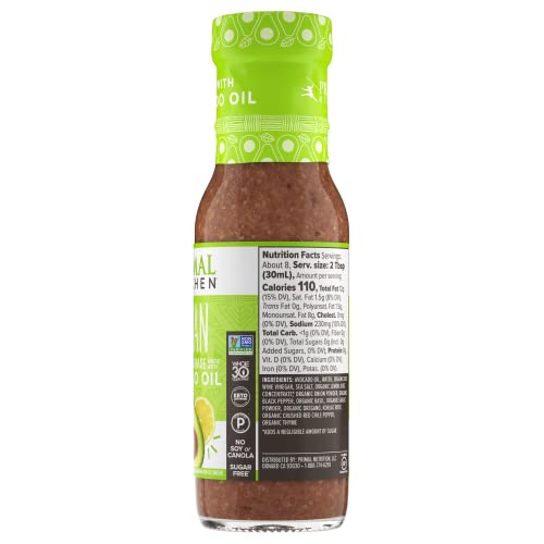 Primal Kitchen Italian Vinaigrette on a vibrant salad bowl