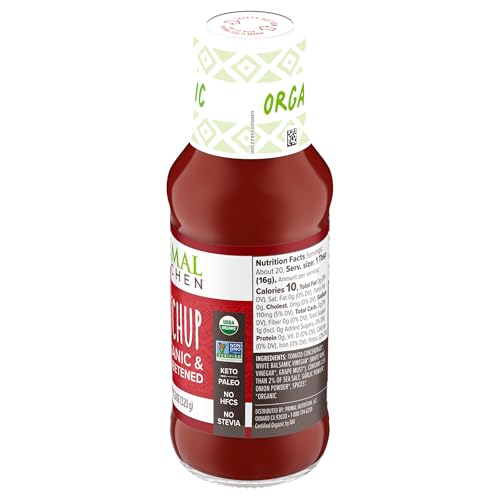 Primal Kitchen Ketchup Unsweetened open bottle on table ready for meals.