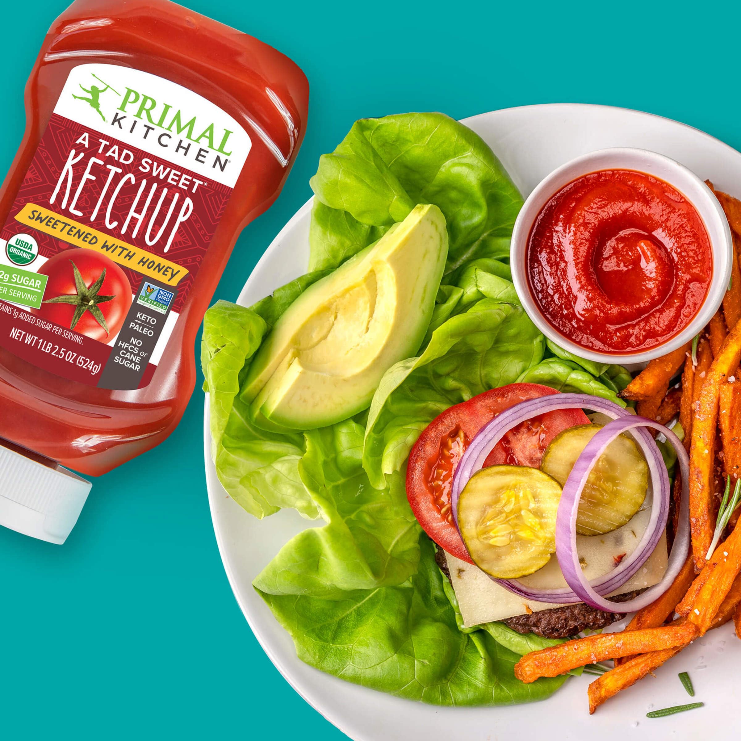 Primal Kitchen Ketchup with Honey Squeeze dipping fries makes meals crave-worthy.