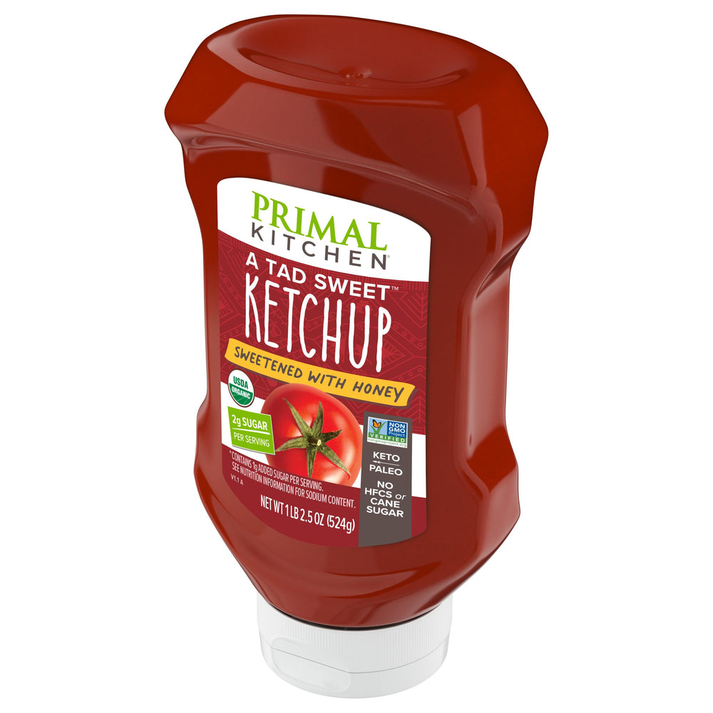 Primal Kitchen Ketchup with Honey Squeeze glass bottle highlights premium presentation.
