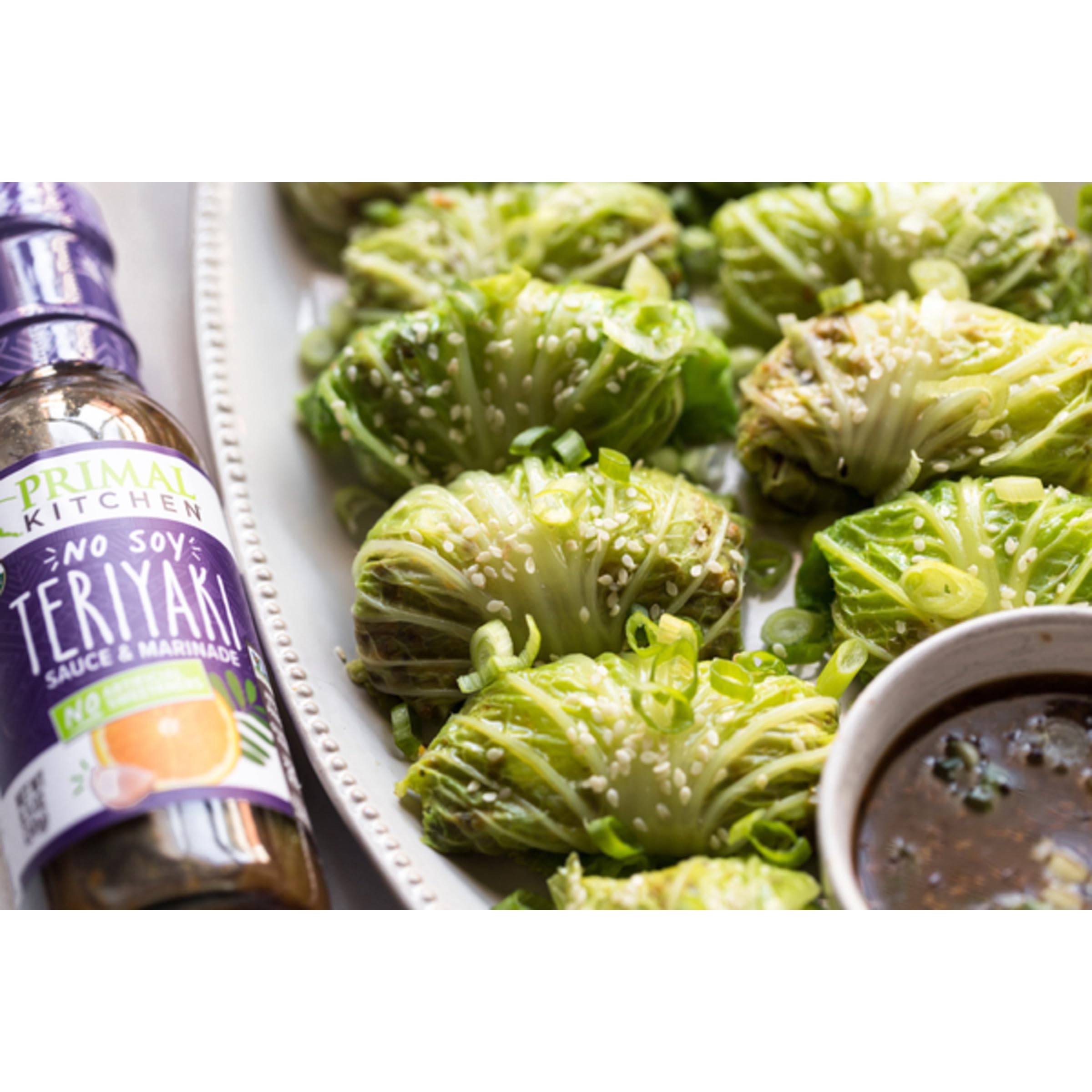 Primal Kitchen No-Soy Teriyaki sauce pour-spout detail highlights easy, mess-free pouring.