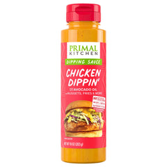 Primal Kitchen Sauce Dip Chicken bottle closeup shows premium ingredients for versatile meals.