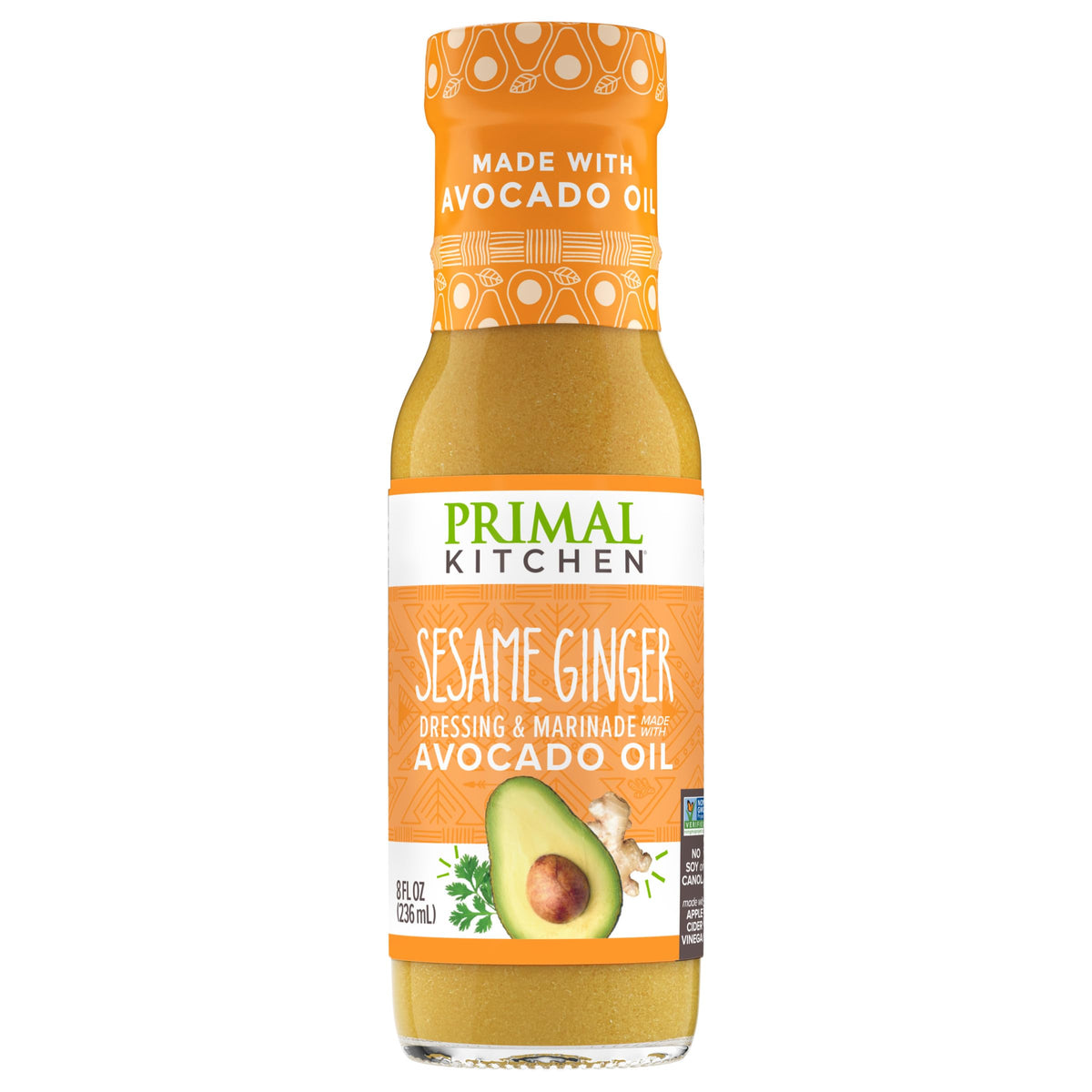 Primal Kitchen sesame ginger bottle pour showing versatile dressing option for salads