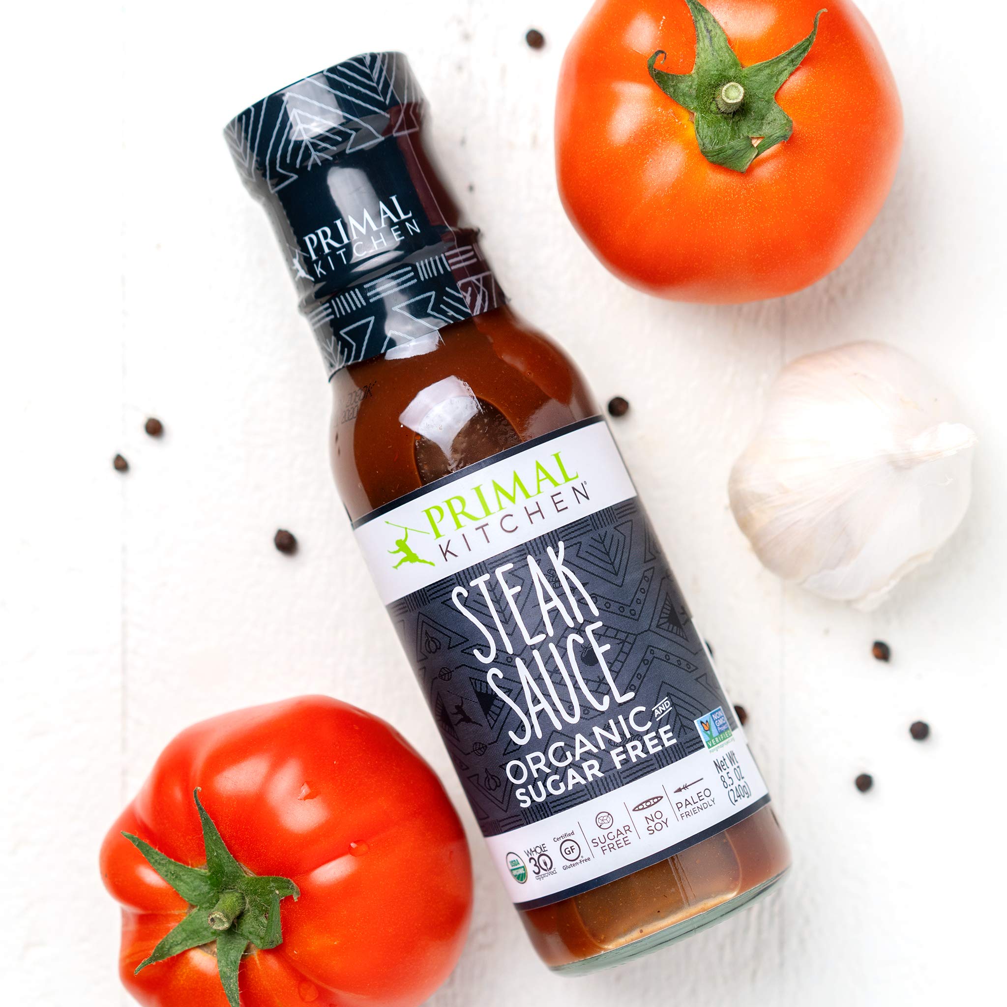 Primal Kitchen Steak Sauce with steak and dipping suggestions on plate