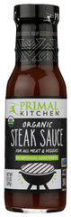 Close-up of Primal Kitchen Steak Sauce ingredients including garlic and pepper.