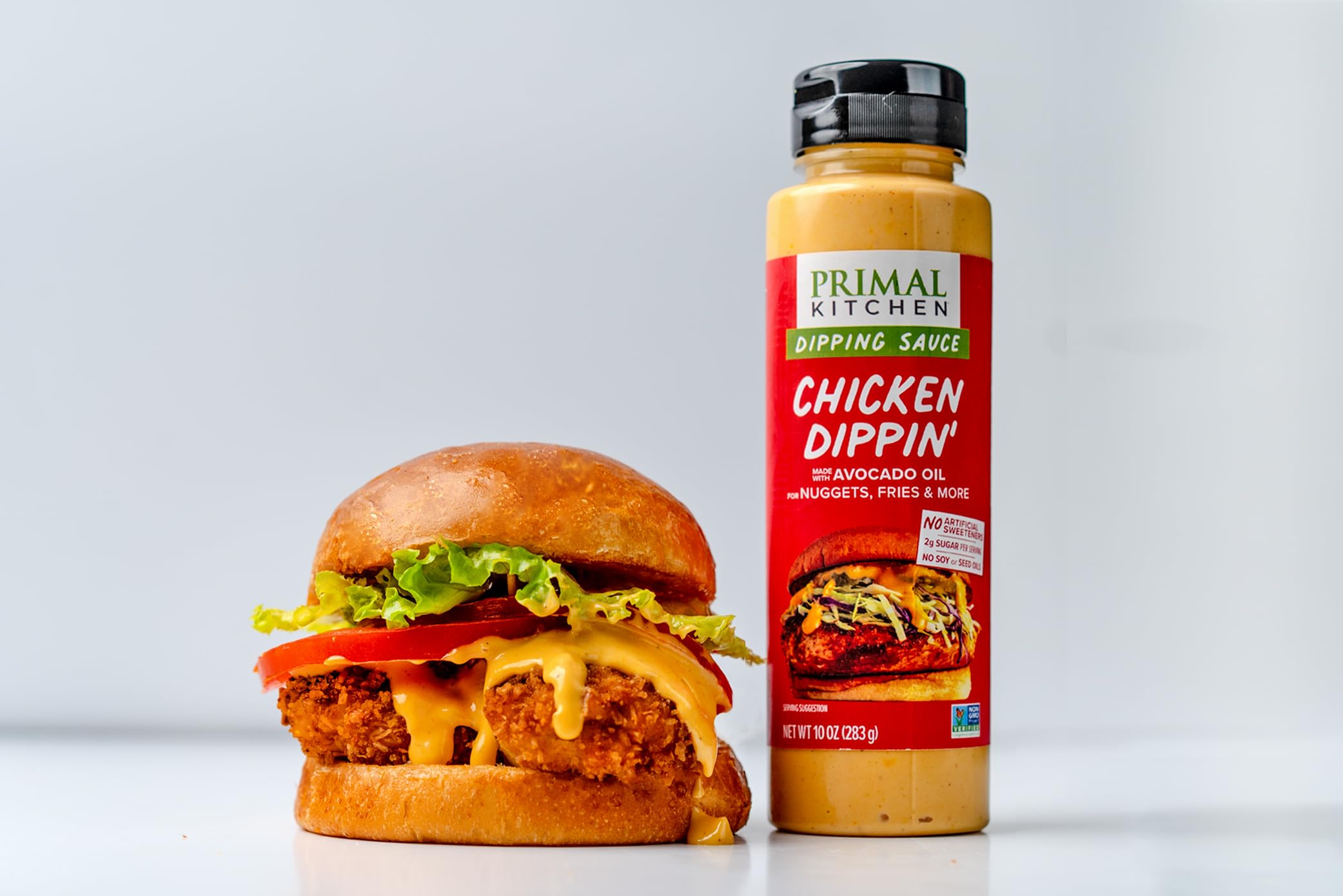 Primal Kitchen Avocado Lime sauce on tacos and salads for added zest