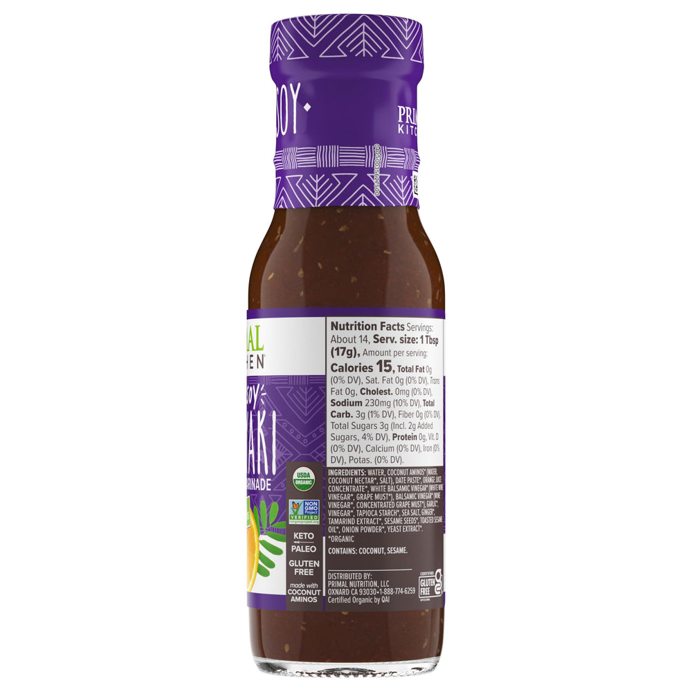 Primal Kitchen Teriyaki sauce neatly arranged bottles on shelf.