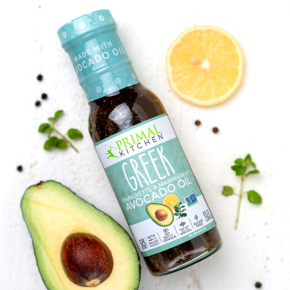 Primal Kitchen avocado oil bottle pairs with keto-friendly dressings for clean fats.