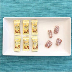 Close-up of glossy ginger candy texture highlighting chewy flavor and aroma.