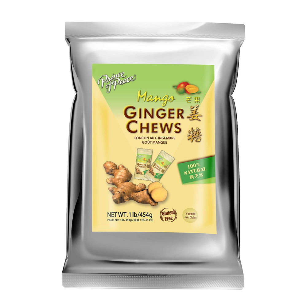 Prince of Peace Mango Ginger Chews bite revealing tropical sweetness.