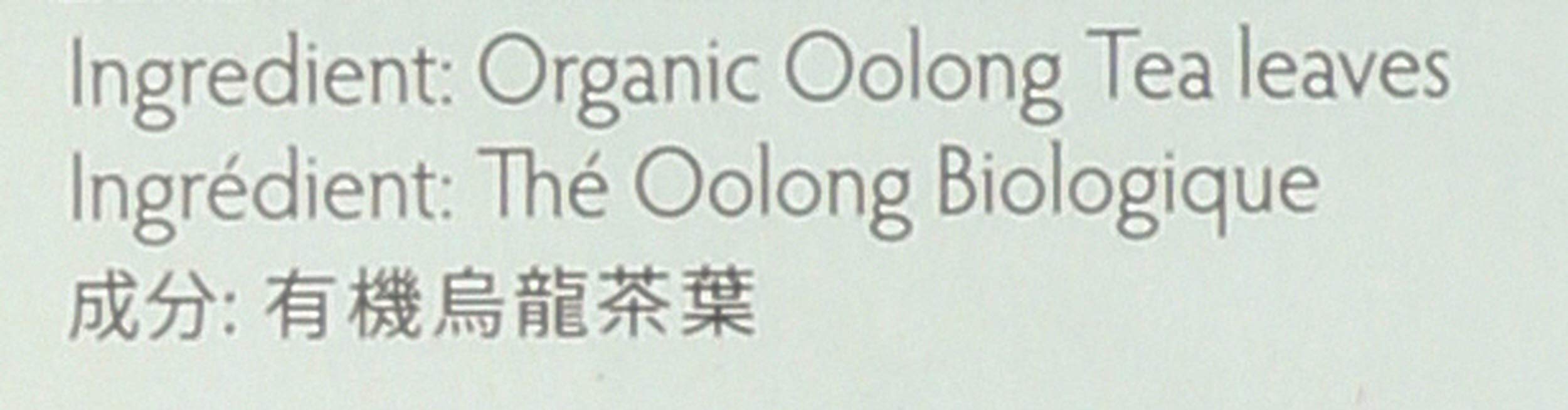 Brewed Prince of Peace Oolong Tea in a cup with amber glow