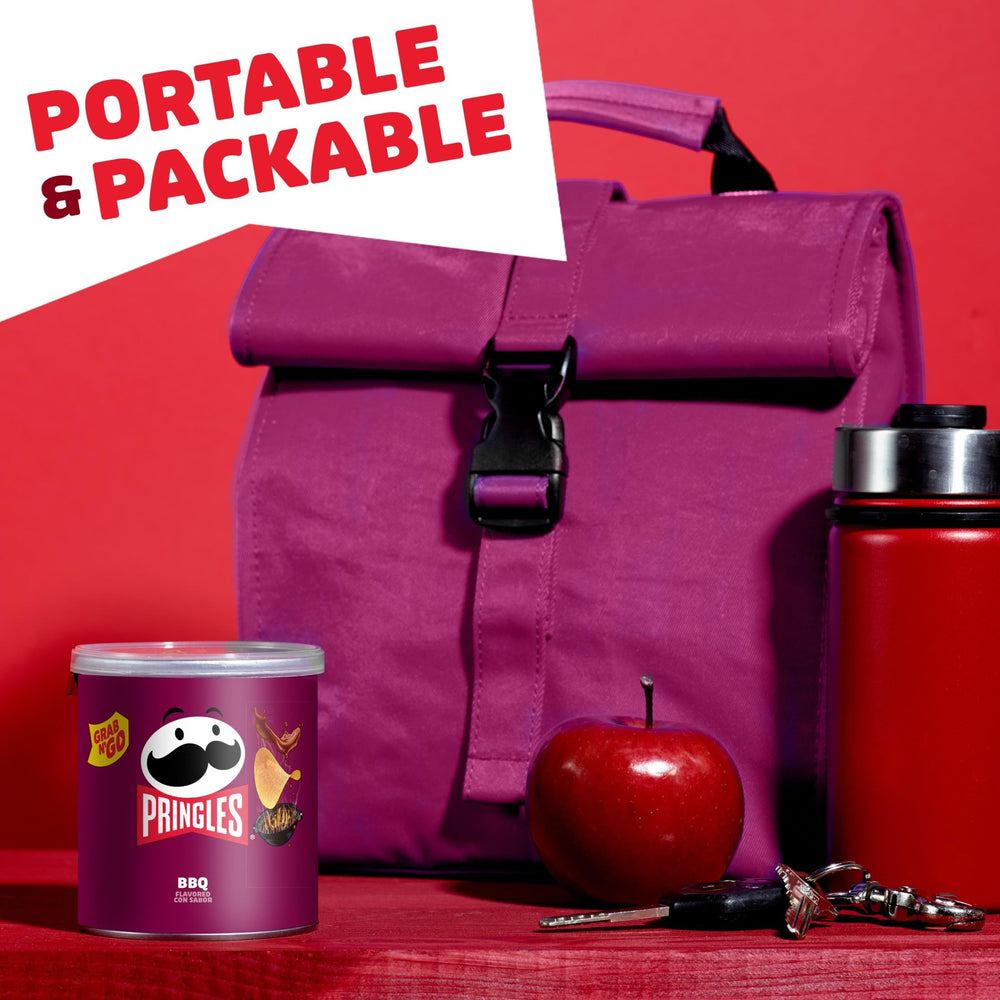 Pringles BBQ can on desk, convenient office snack option