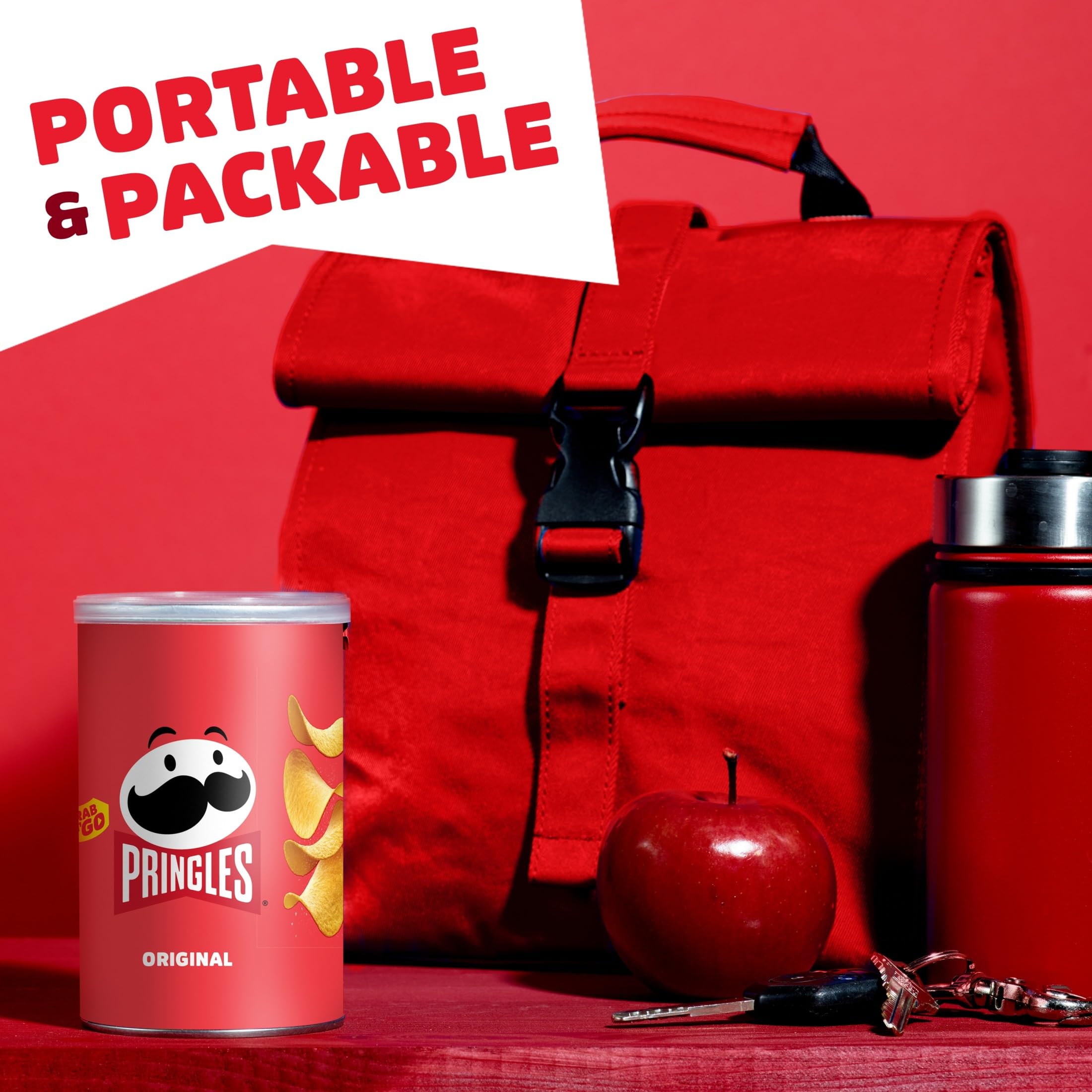 Pringles Original Potato Crisps on an office desk snack