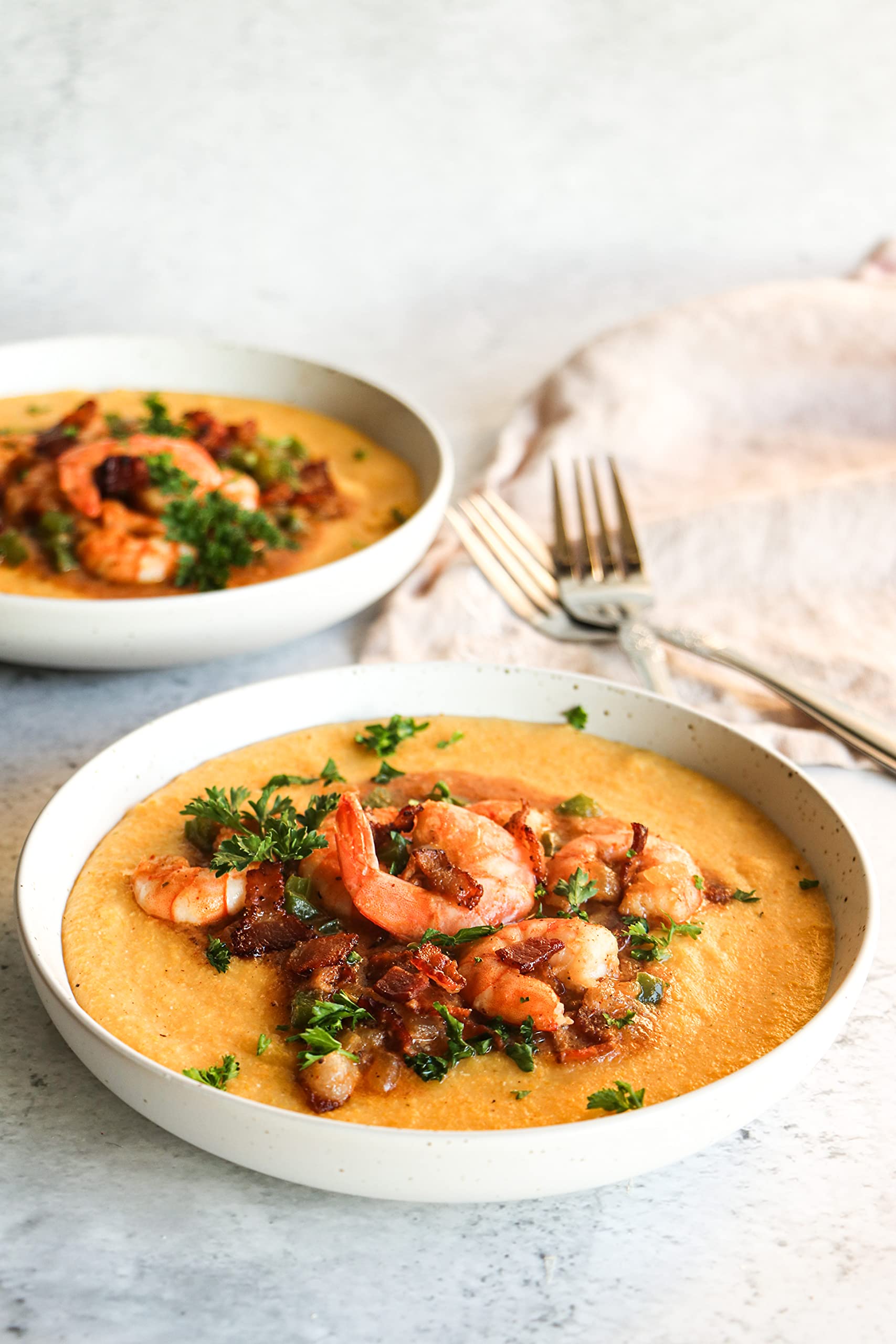 Professor Torbert's Orange Corn Grits creamy bowl closeup highlighting silky texture.