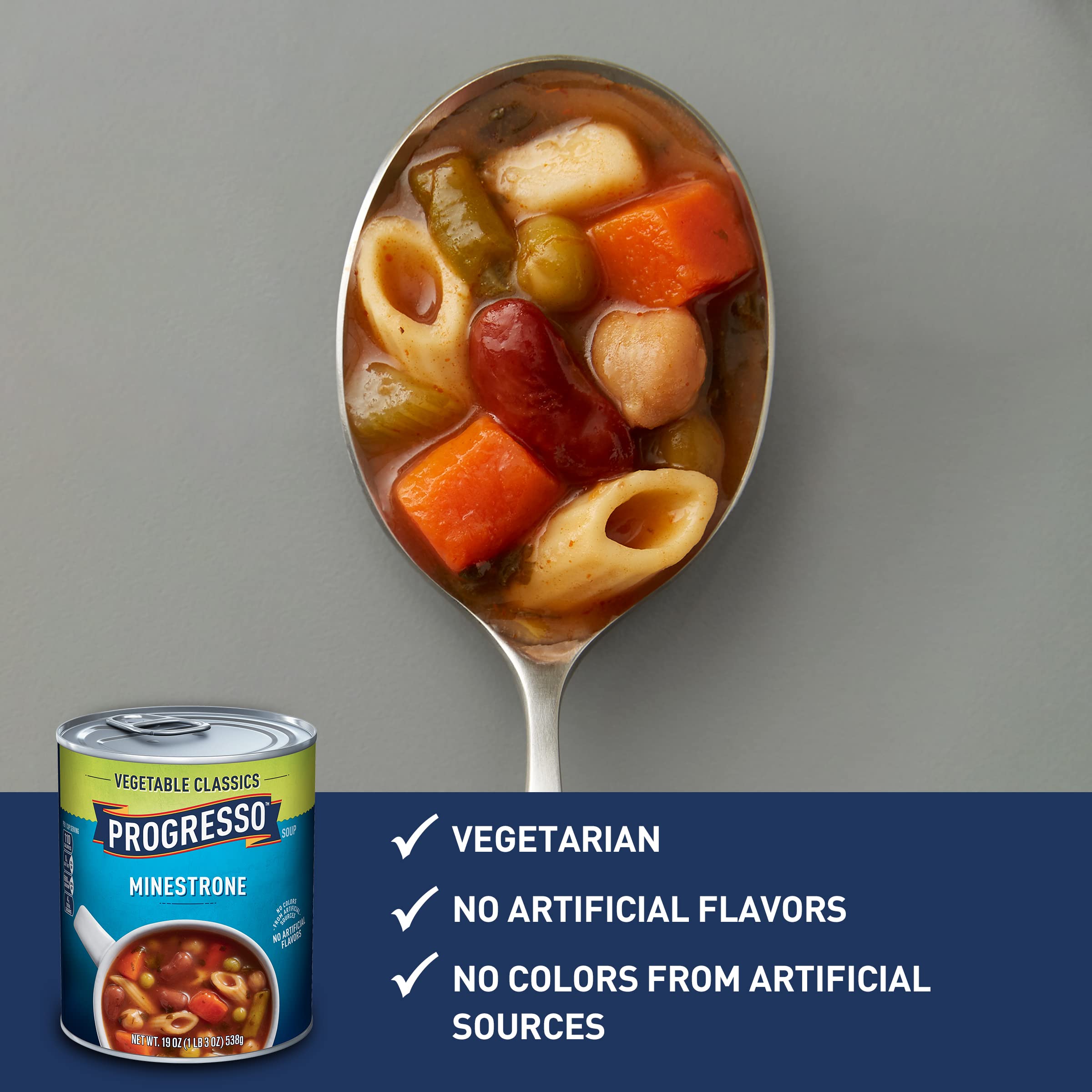 Progresso Minestrone soup spoon dipping into a warm bowl
