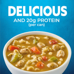Close-up of Progresso soup ingredients including meatballs, pasta, chicken and vegetables.