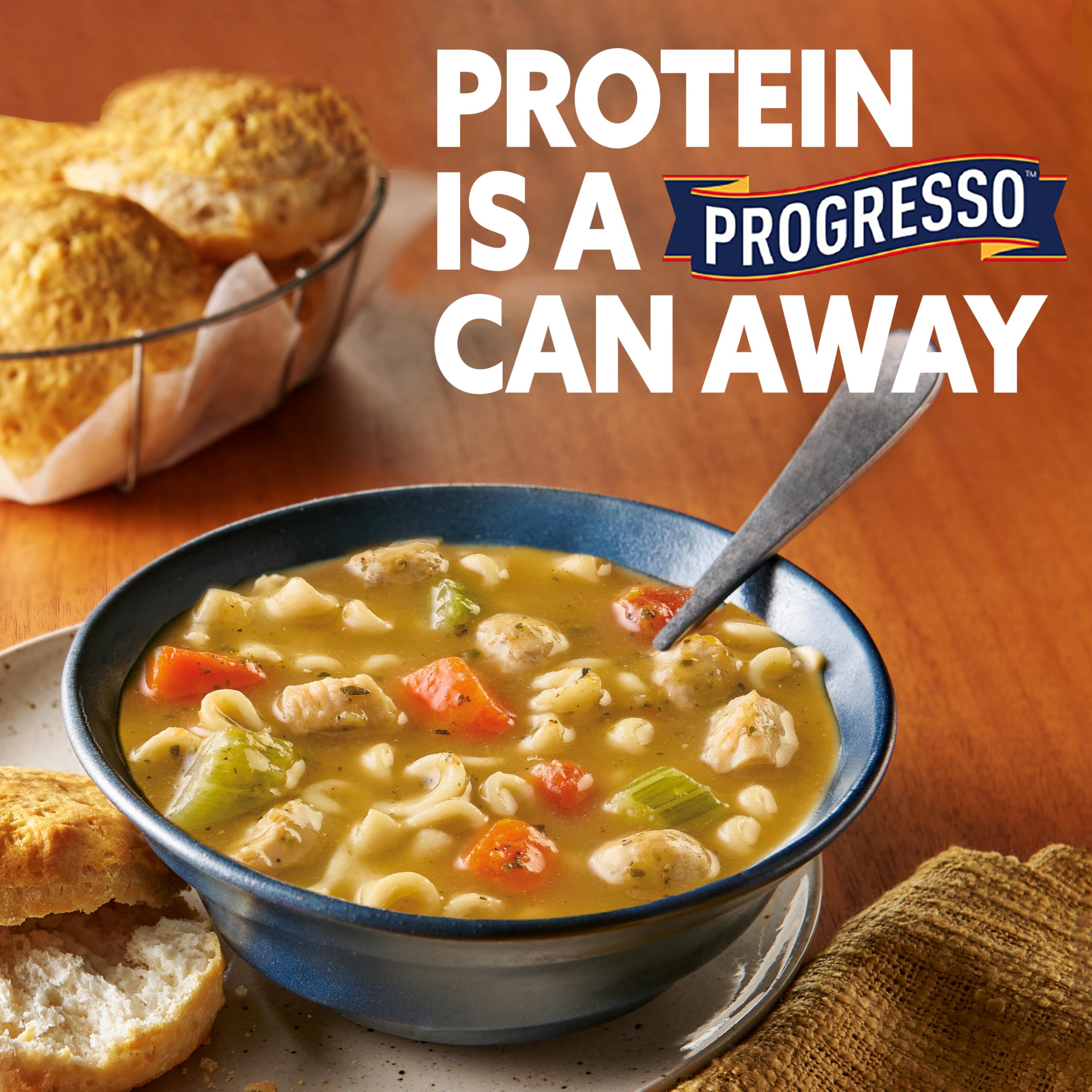 Steam rising from Progresso Protein Mediterranean-Style Meatball and Chicken Soup in a microwave-safe bowl.