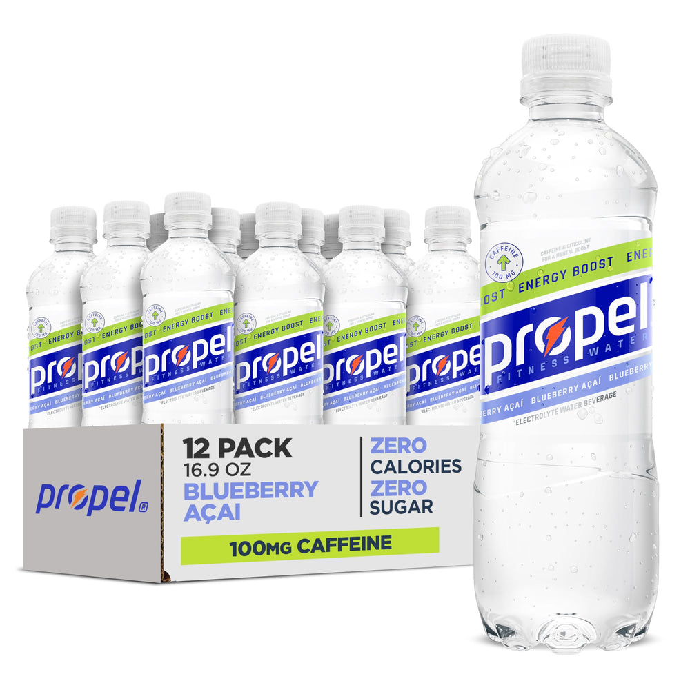 Propel Energy Boost Blueberry Acai bottle on a gym counter ready to hydrate