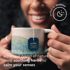 Pukka Calming Chamomile cup with steam highlighting relaxing aroma