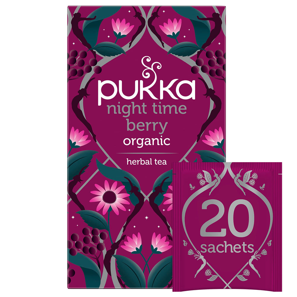 Pukka Night Time Berry tea bag in a cup for a soothing evening ritual.
