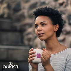 Pukka Night Time tea bag closeup highlights chamomile and lavender aromatics for sleep