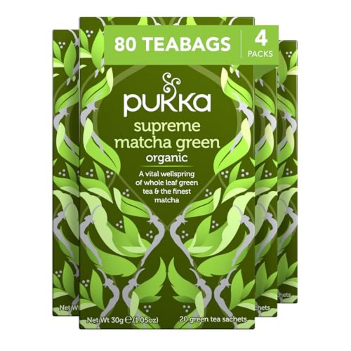 Pukka Supreme Matcha tea bag closeup showcasing vibrant, caffeine-free infusion aroma.