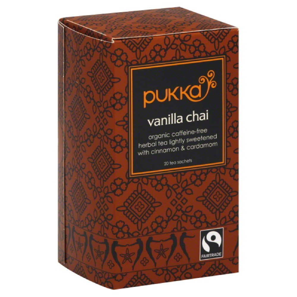 Pukka Vanilla Chai Organic tea bag releasing vanilla spice aroma for a soothing caffeine-free moment.