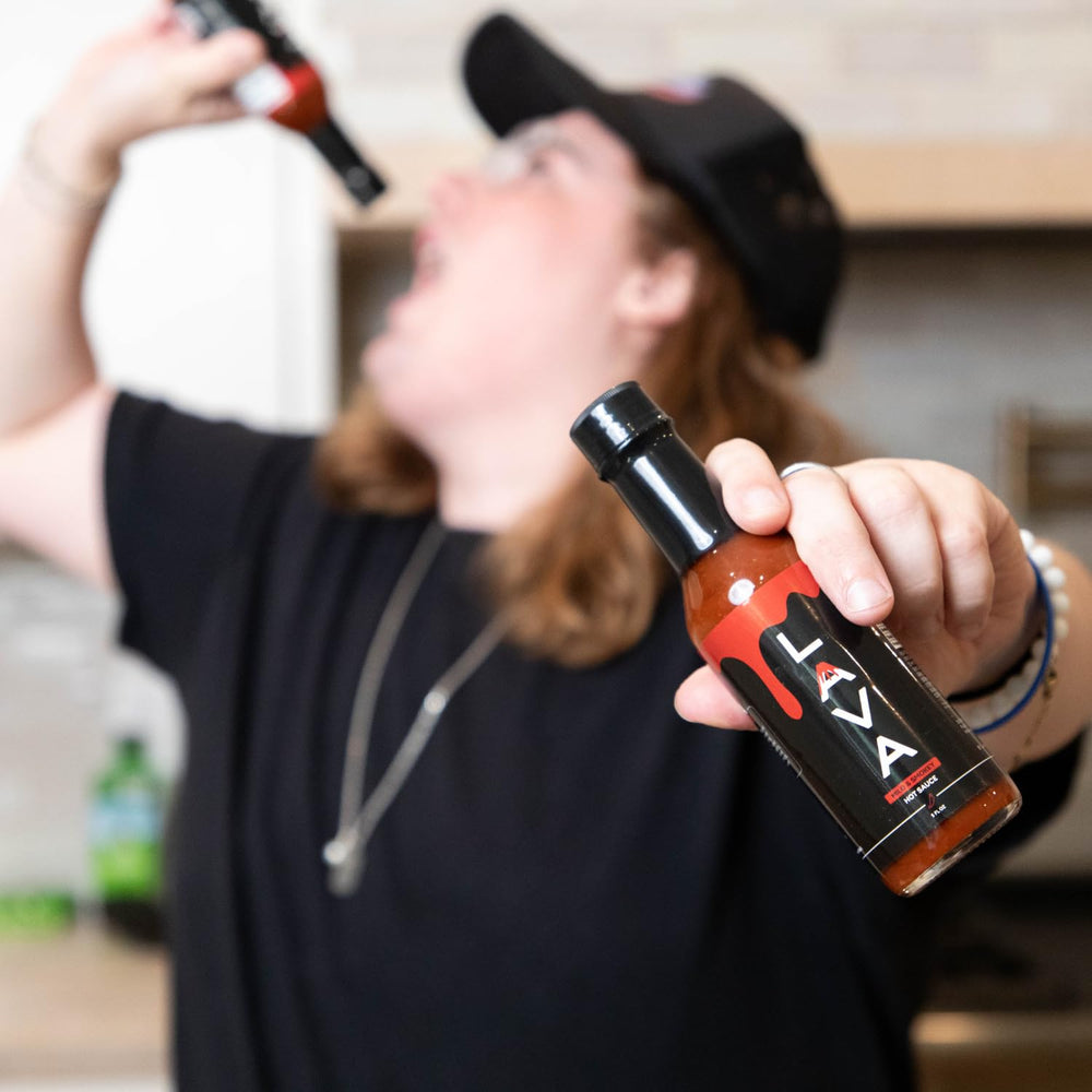 PUP AND THE PEPPER Lava Sauce glaze on wings for smoky kick