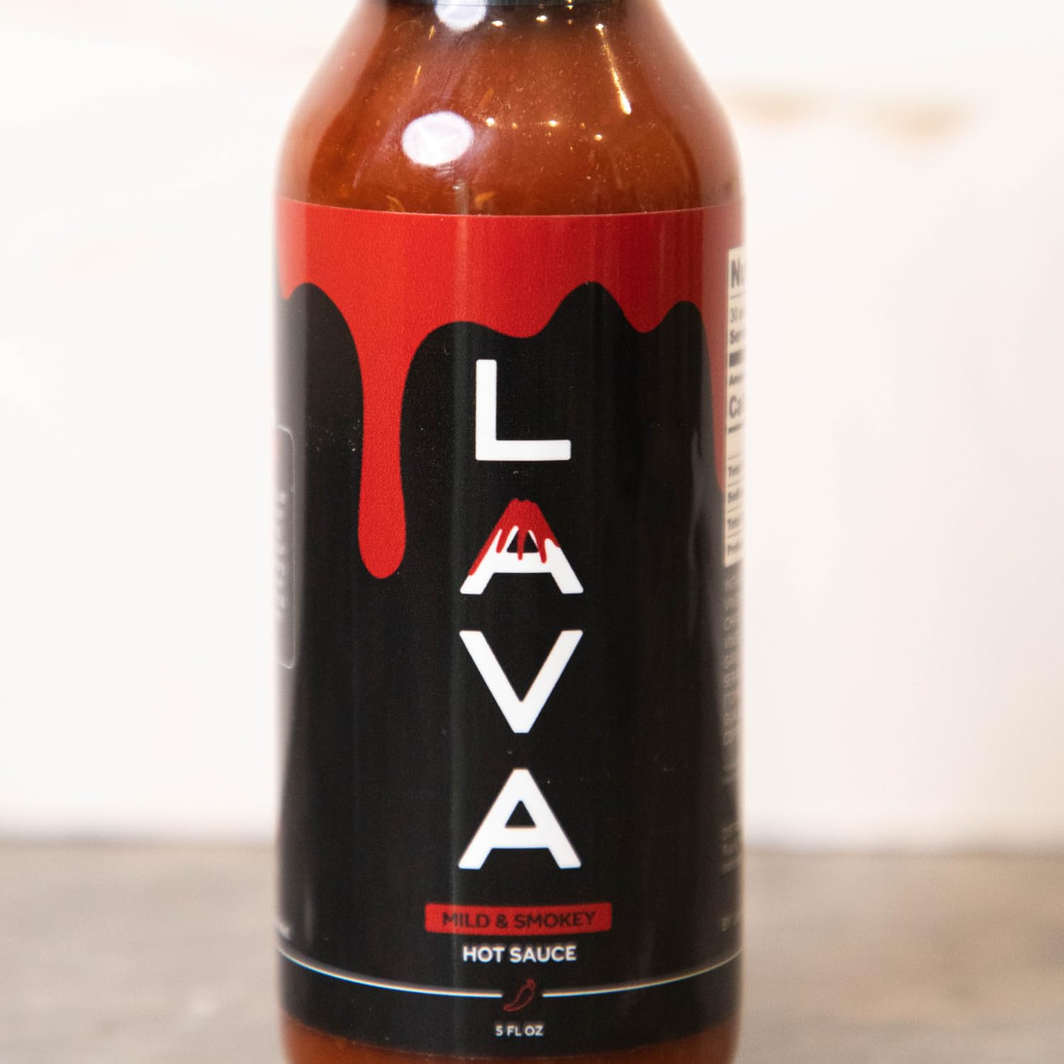 PUP AND THE PEPPER Lava Sauce bottle on a gift-ready label