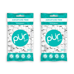 PUR Gum Wintergreen Mint pack on table, two-pack convenient for on-the-go breath refreshment.