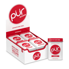 PUR Mints Cinnamon tin close-up with fiery flavor for after-meal refreshment.