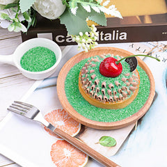 Purbot green sanding sugar pouring sprinkles create even coverage.