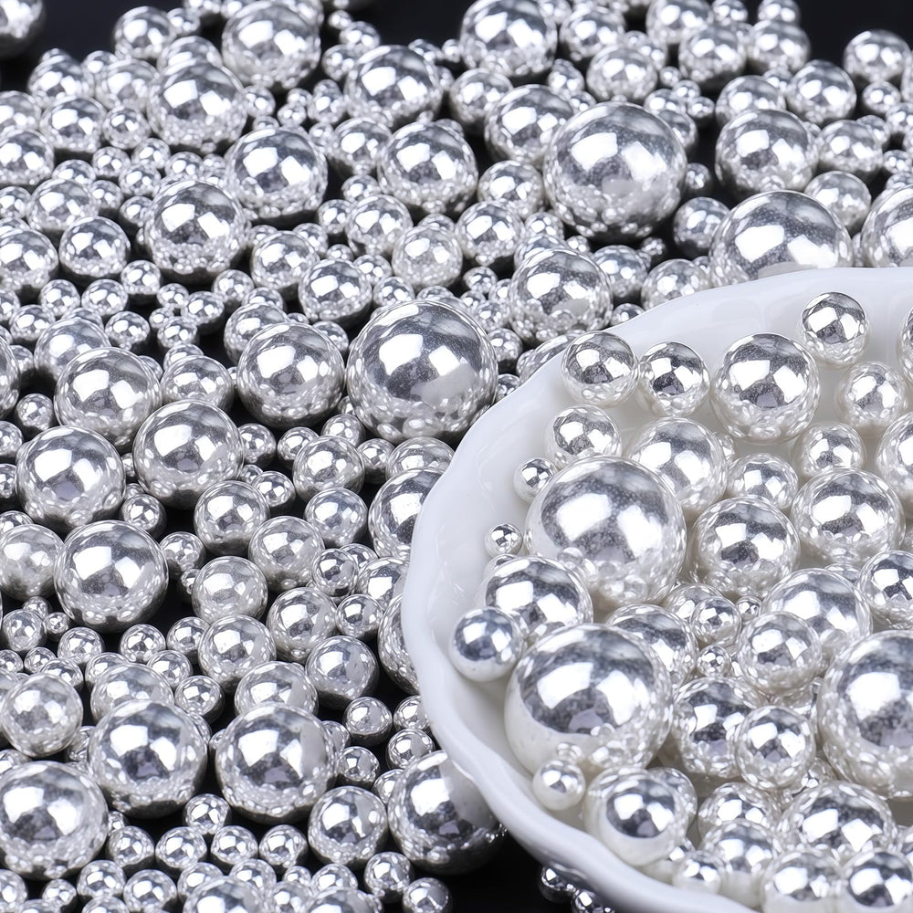 PURBOT Silver Pearl Sprinkles on a cake, creating an elegant pearlized finish for refined celebrations