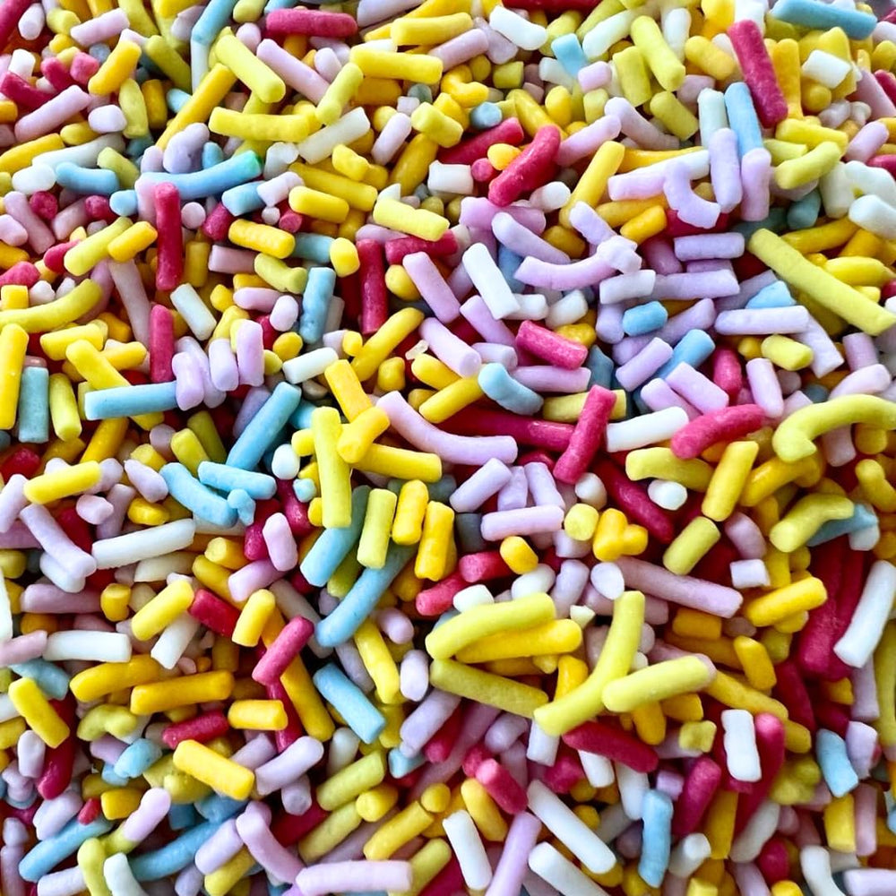 Pure Food by Estée rainbow sprinkles topping ice cream.