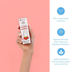 Pure Inventions Water Infusion Drops pour shot in a clear bottle with Cranberry & Elderberry