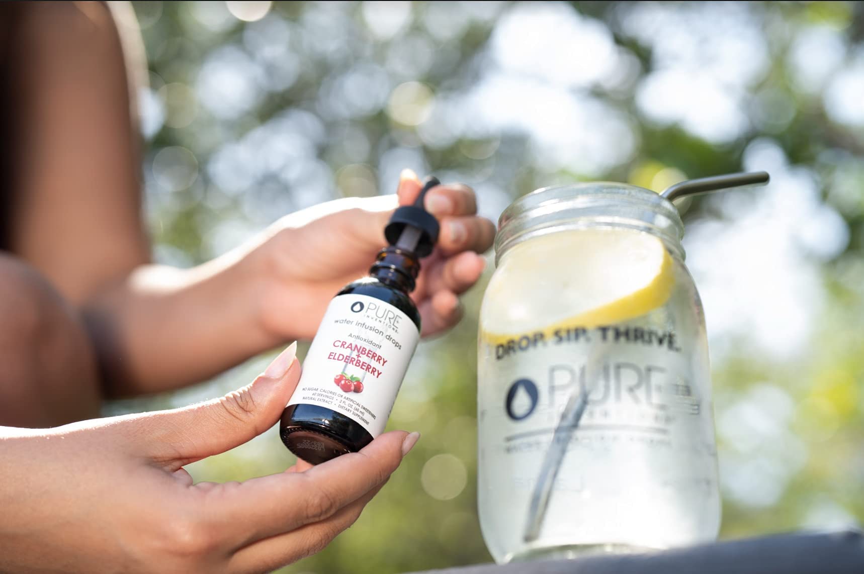 Pure Inventions Water Infusion Drops glass bottle packaging emphasizes eco-friendly design