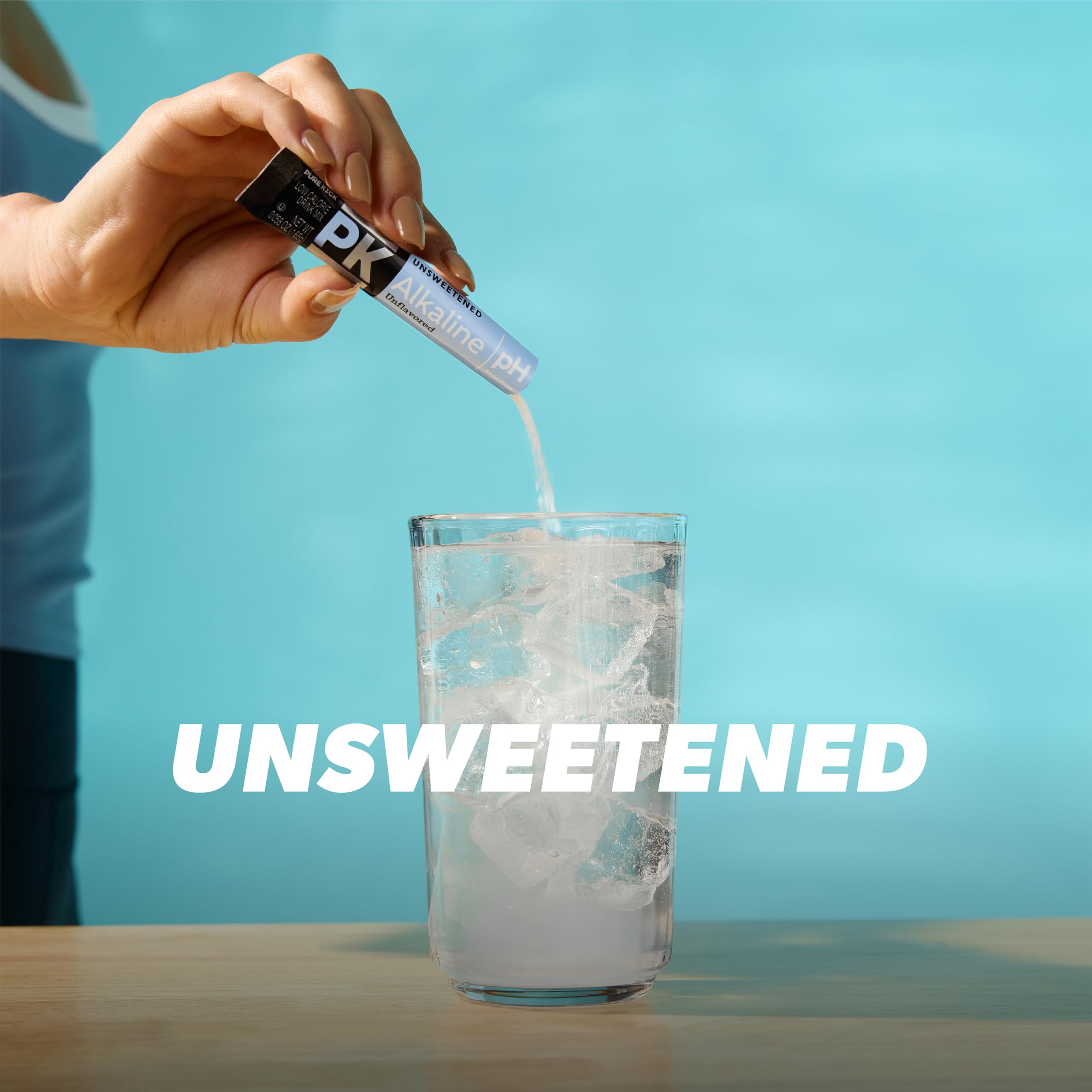 Glass of water with Pure Kick Alkaline for refreshed hydration.