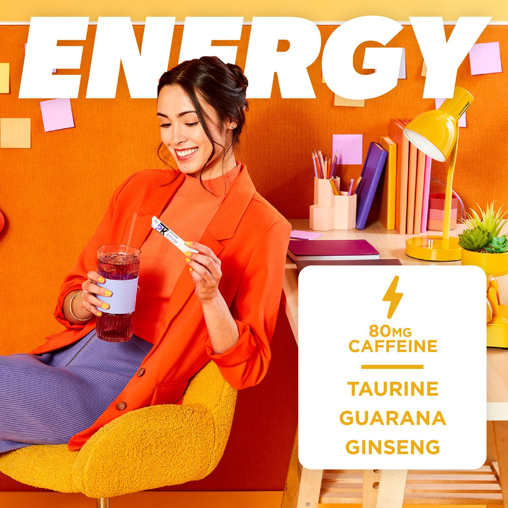 Pure Kick energy singles pour into water, showing fast dissolve for refreshing drink.