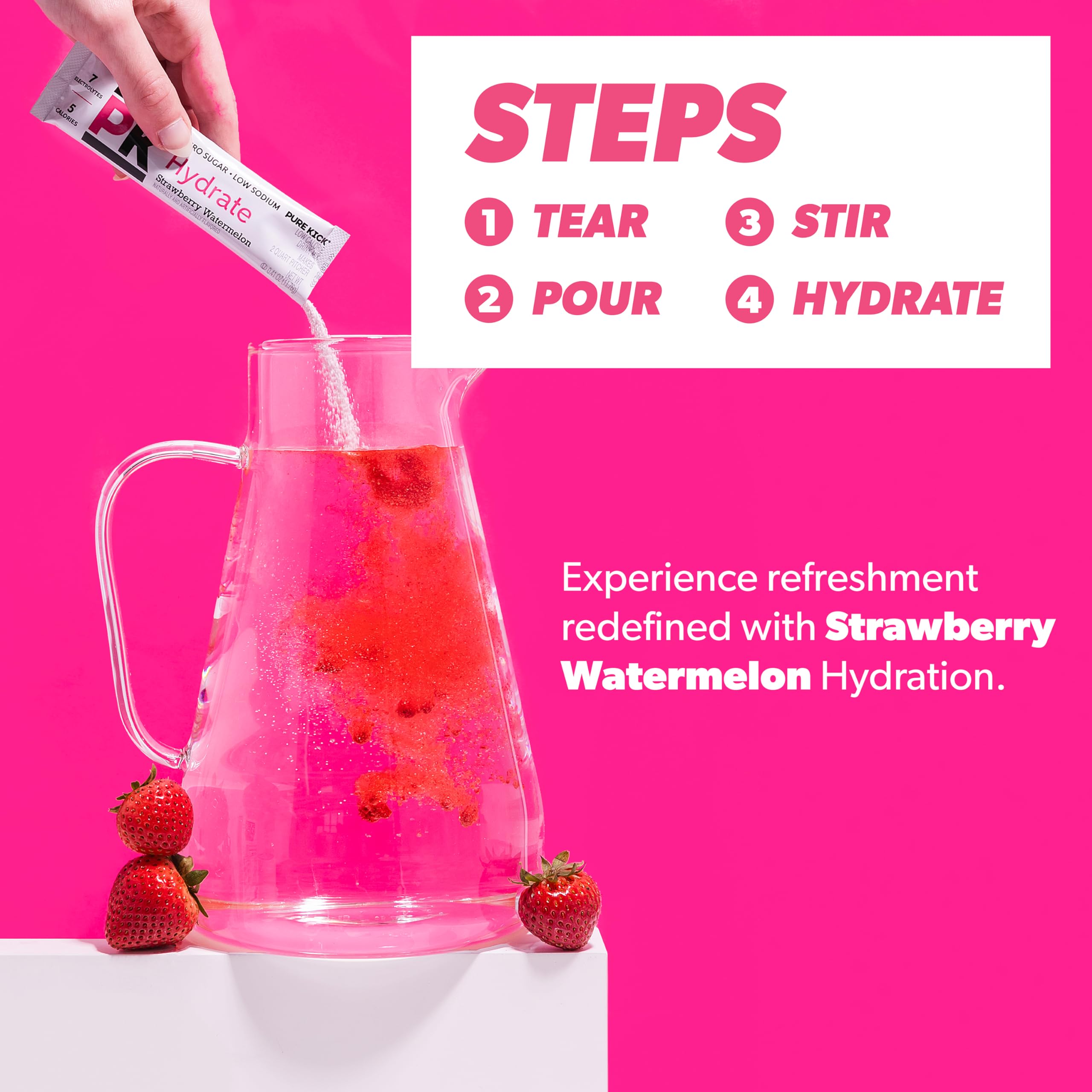Glass filled with Pure Kick strawberry watermelon hydration ready to sip.