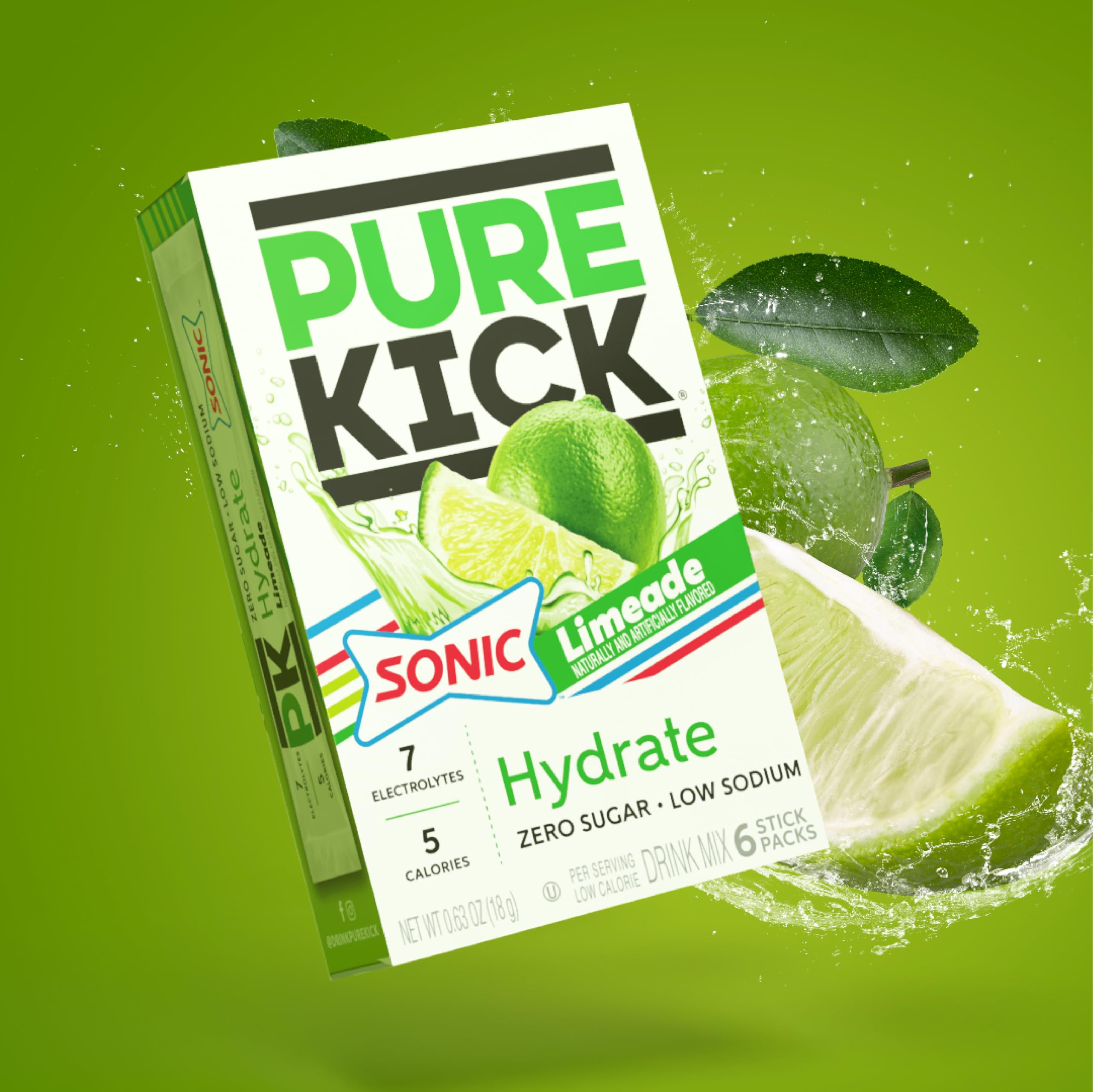 PURE KICK hydration packet dissolving in cold water to create a bright lime drink.