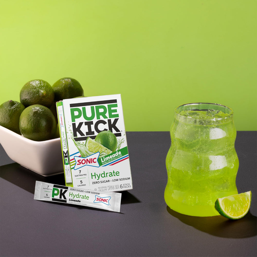 PURE KICK single-serve boxes arranged for easy use in a gym bag.