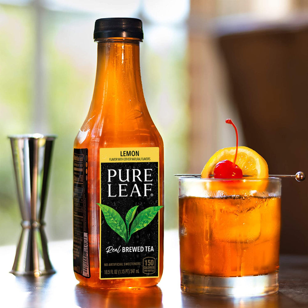 Pure Leaf Iced Tea Lemon glass with ice—perfect for serving.