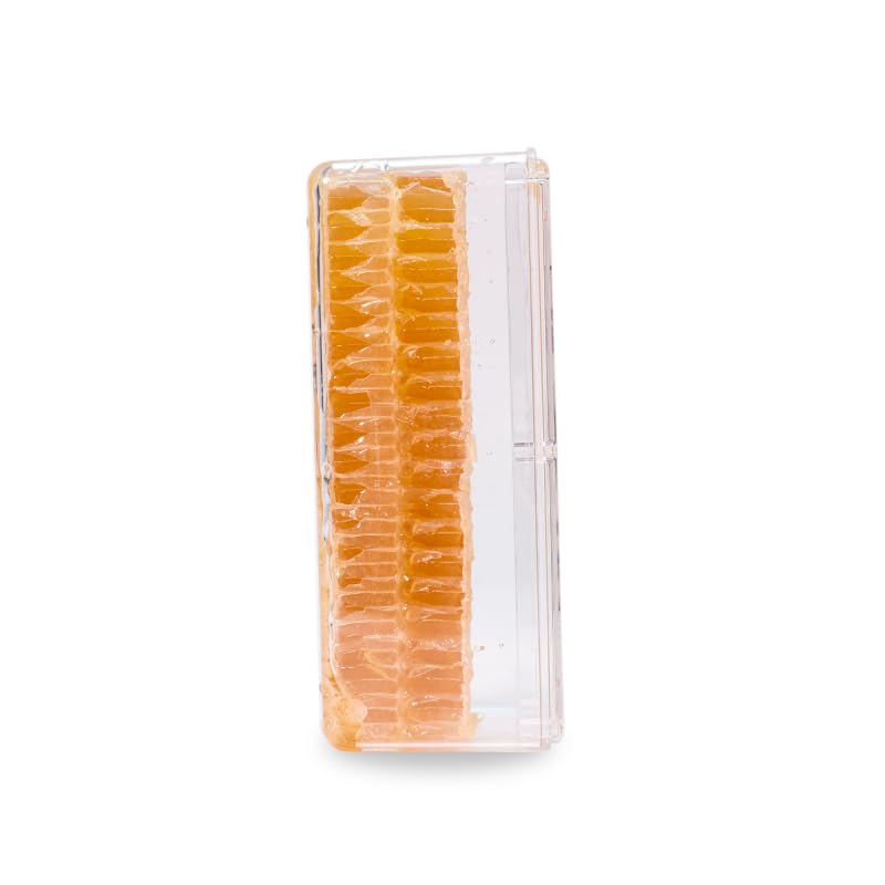 Pure Southern Honey hand-filled bottle; small family operation ensures quality control.