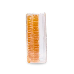 Pure Southern Honey hand-filled bottle; small family operation ensures quality control.