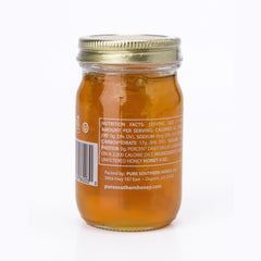 Pure Southern Honey mini 4oz jar close-up highlighting unheated raw honey.