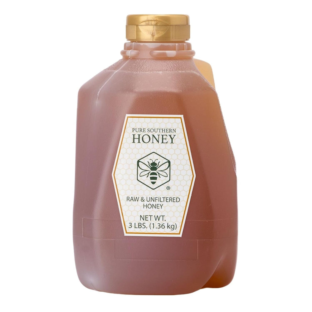 Pure Southern Honey wildflower honey bottle on kitchen counter, natural sweetener at hand