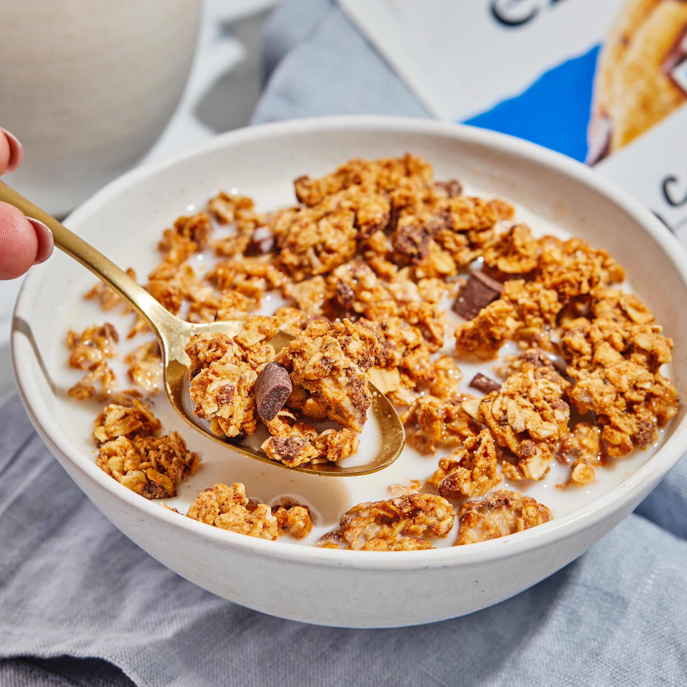 Snack-ready clusters of Purely Elizabeth granola Chocolate Chip great for on-the-go