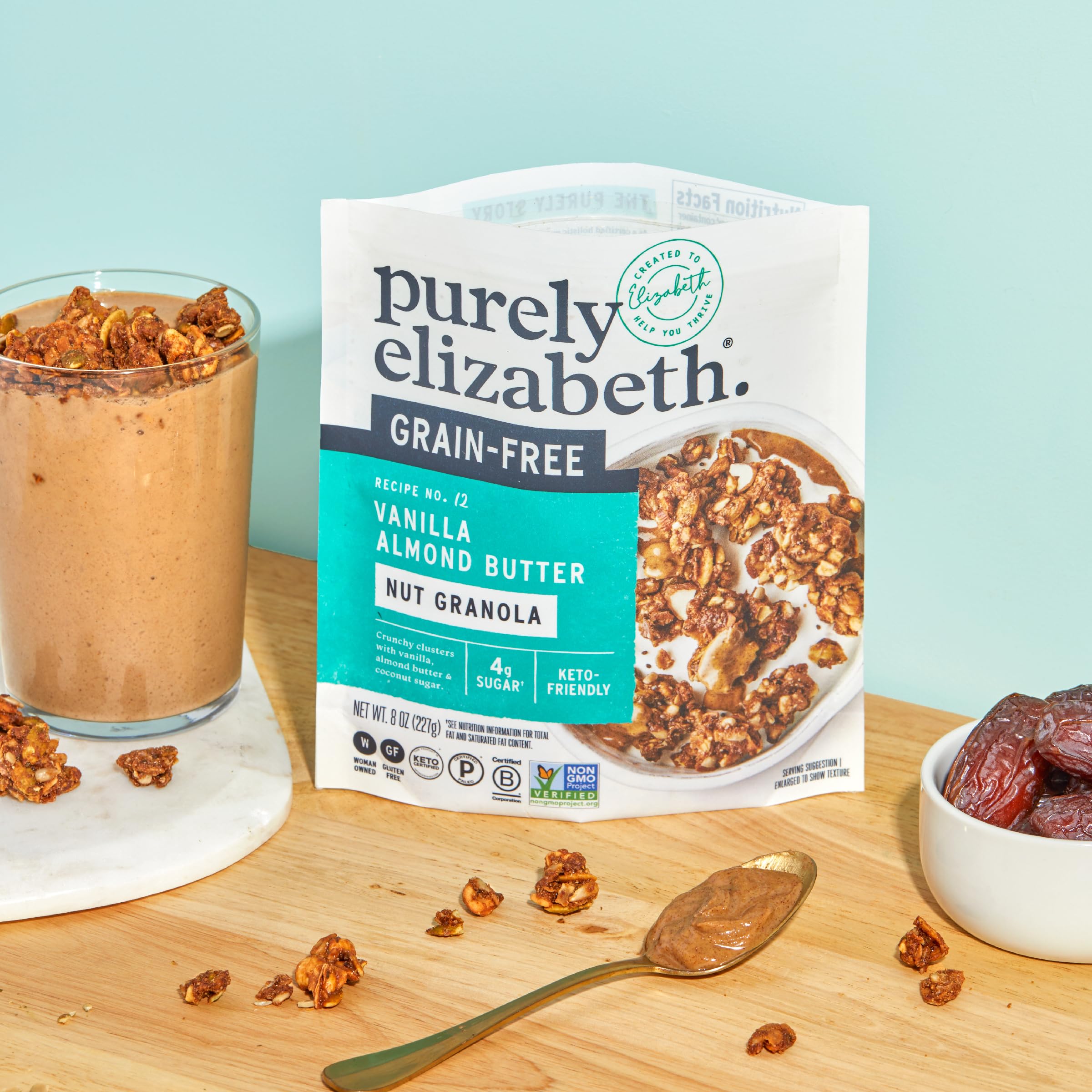 Granola in a bowl with milk featuring Purely Elizabeth.